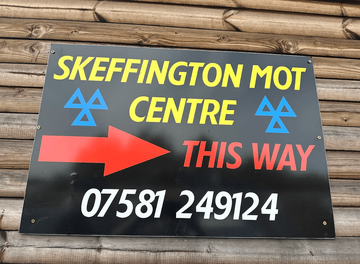 Mechanic working on a car